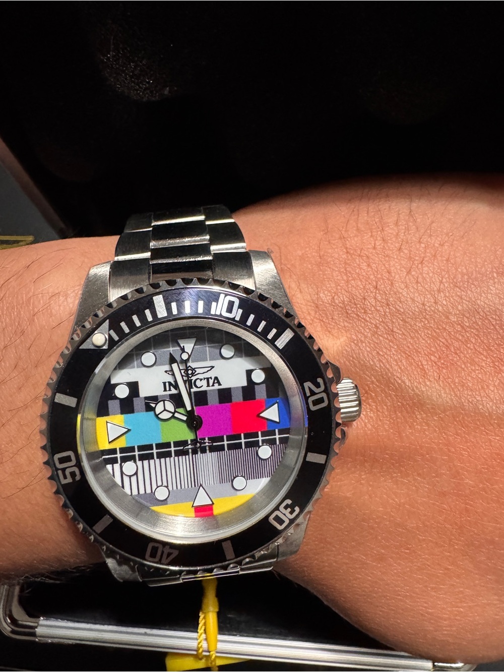 Invicta Watch with Black Bezel and Color Test-Pattern Dial